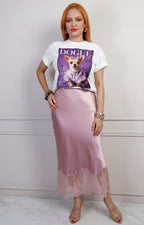 Falda larga regular con encaje de Boutiquemirel, diseñada en tela suave con detalles de encaje en la parte superior.