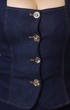 Conjunto de mezclilla con botones dorados