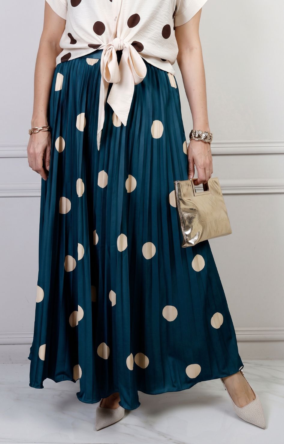 Falda plisada de polka dots