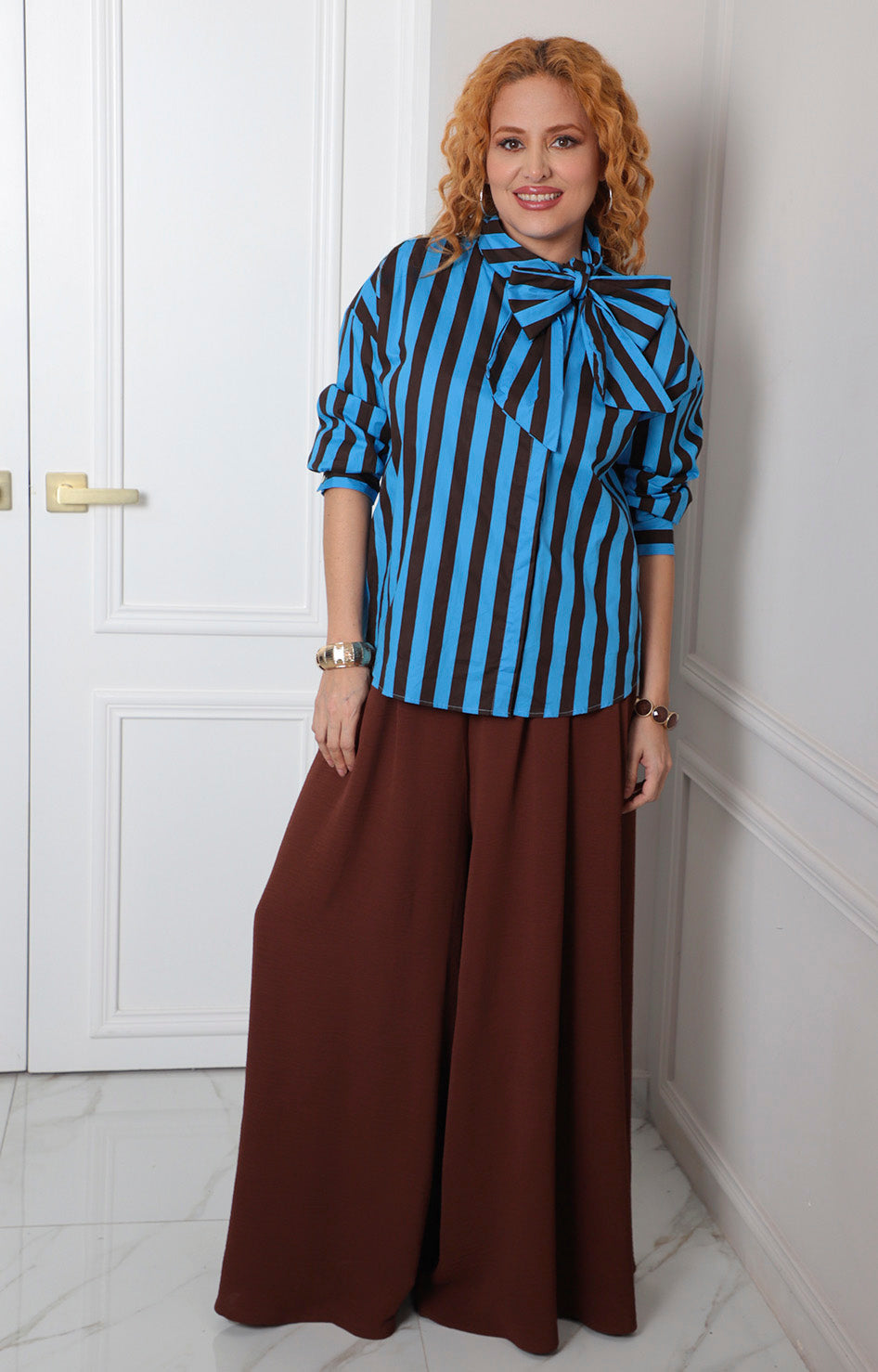 Blusa a rayas con lazo al cuello