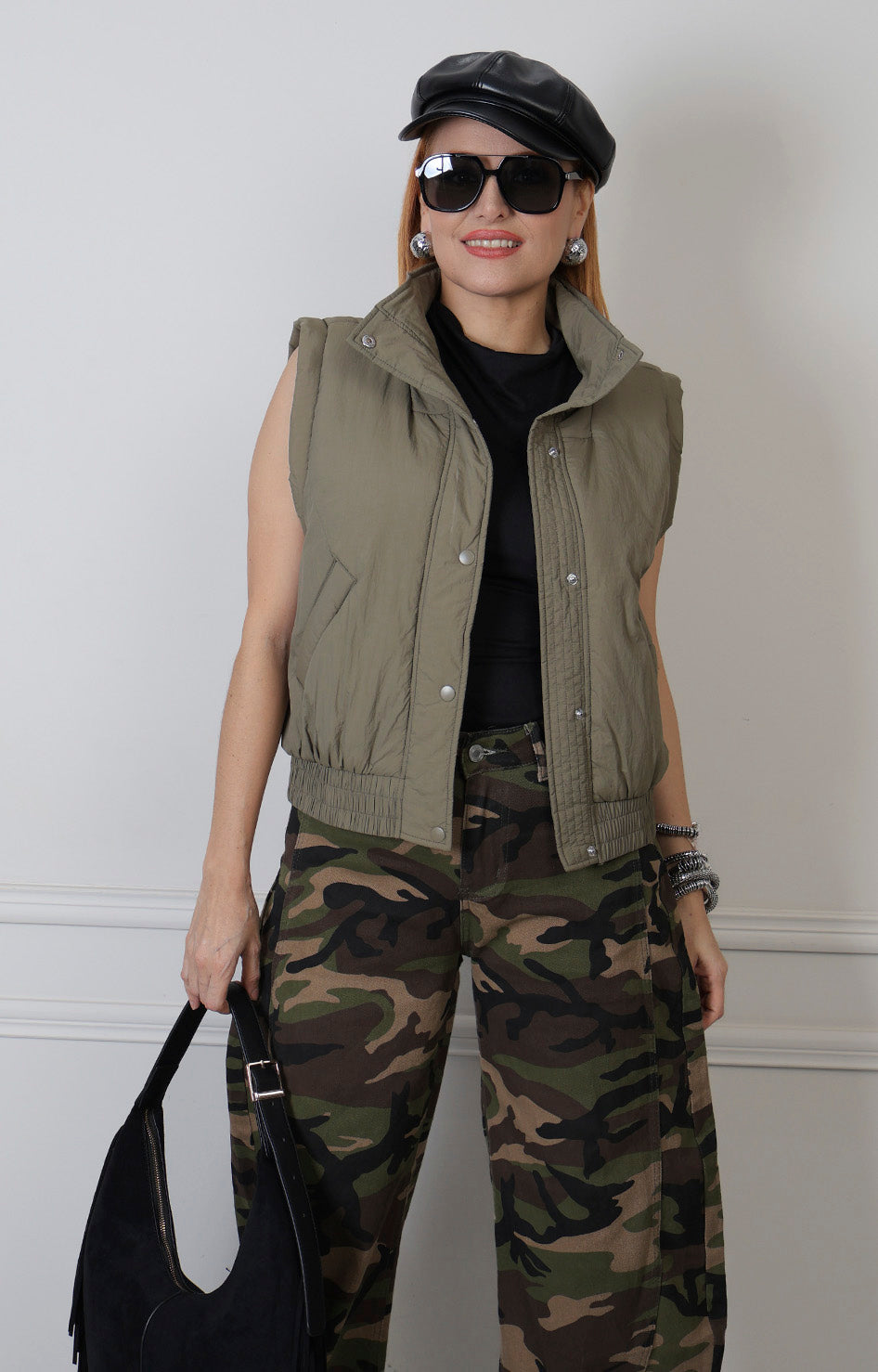 Chaleco verde acolchado de cuello alto Boutiquemirel, diseño regular y sin mangas