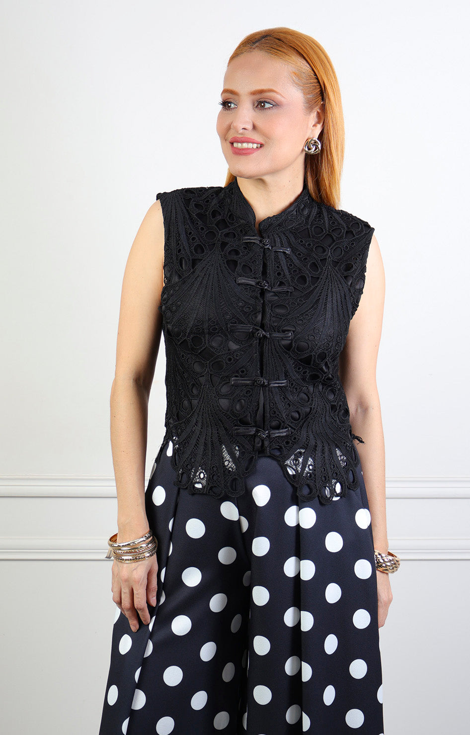 Chaleco de encaje con cierres al frente