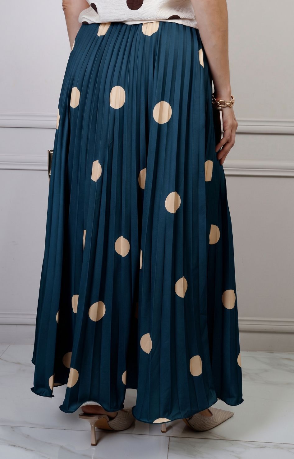 Falda plisada de polka dots