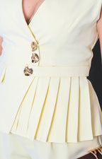 Conjunto amarillo sastre con plisado