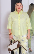 Blusa lisa con perlas