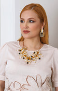 Collar dorado en racimo