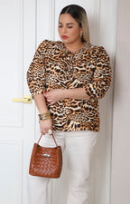 Blusa animal print con lazos al frente