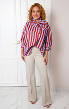Blusa satinada con rayas y lazo