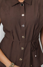 Blusa sin mangas con botones dorados