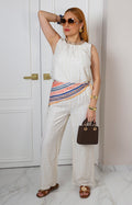 Conjunto beige con bordado calado