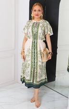 Vestido beige estampado con lazo