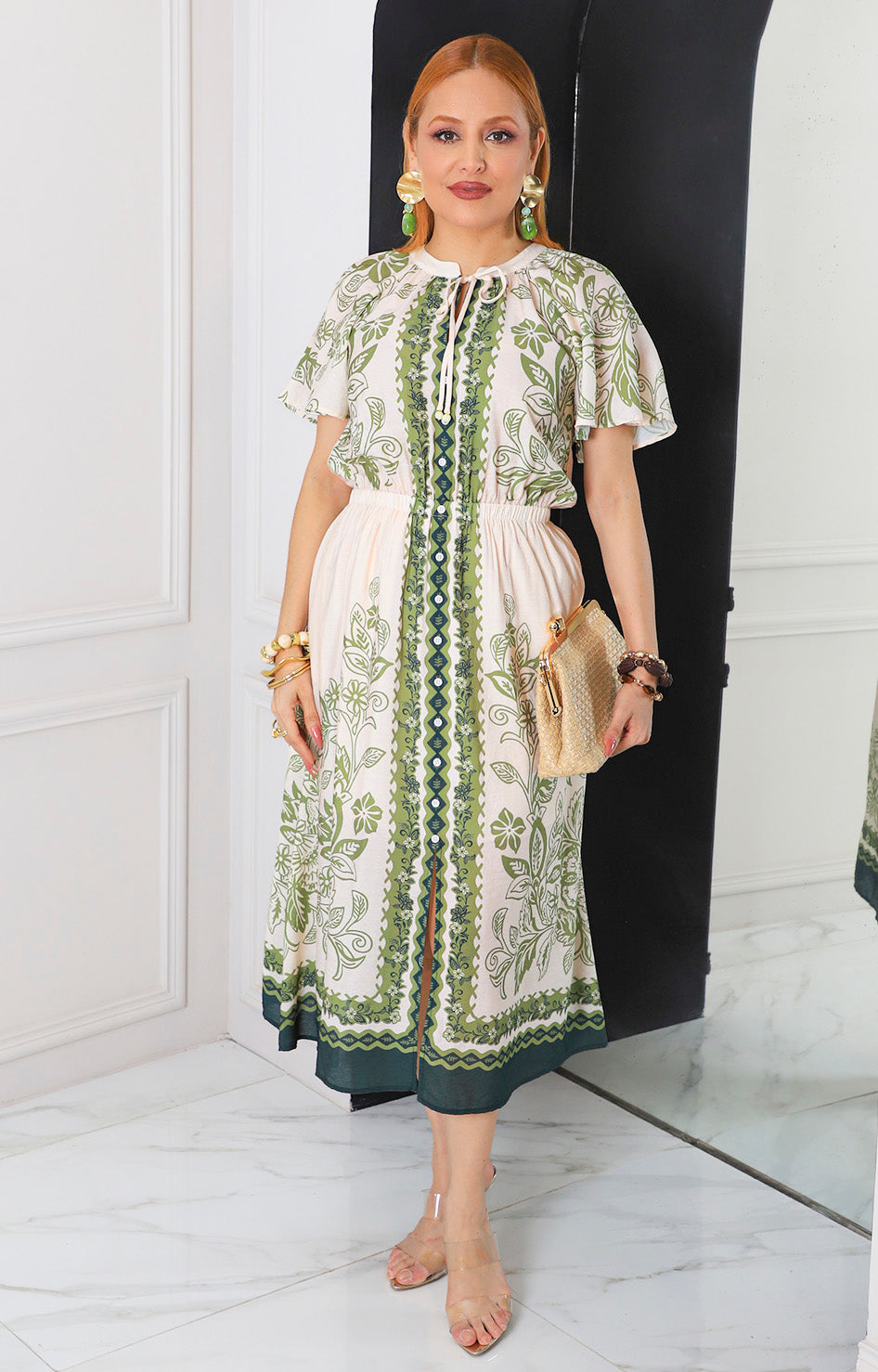 Vestido beige estampado con lazo