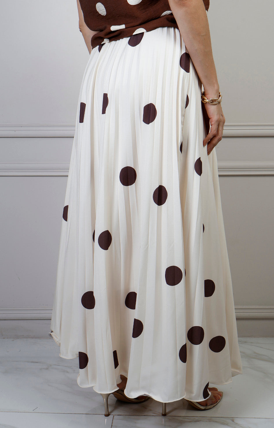 Falda plisada de polka dots