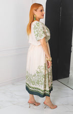 Vestido beige estampado con lazo