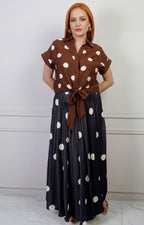 Falda plisada de polka dots