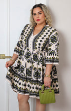 Vestido con estampado geométrico y lazo