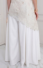 Pantalón amplio Boutiquemirel de estilo regular, con corte cómodo y tela suave, visible en la imagen.