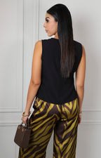 Blusa negra sin manga con drapeado