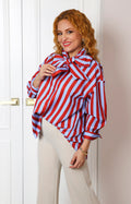 Blusa satinada con rayas y lazo