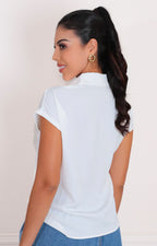 Blusa blanca con aplicaciones