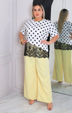 Blusa blanca con polka dots y encaje