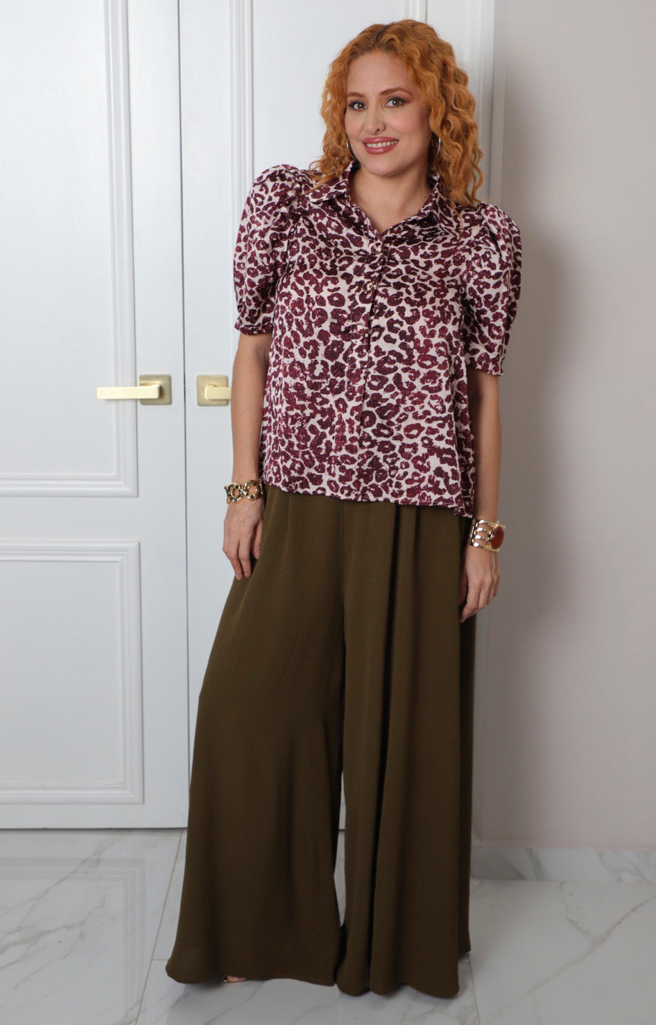 Blusa estampado animal print con mangas globo