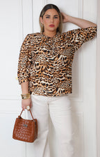 Blusa animal print con lazos al frente