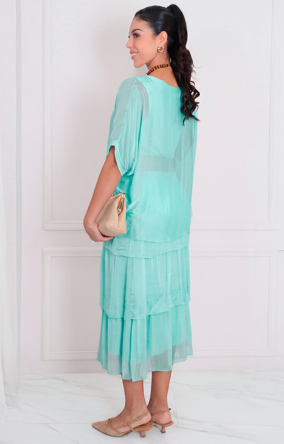 Vestido liso con volantes