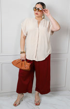 Blusa beige con cuello en V
