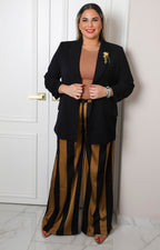 Saco con mangas globo de la marca Boutiquemirel, estilo curvy, en color neutro, mostrando el diseño de las mangas y el corte ajustado