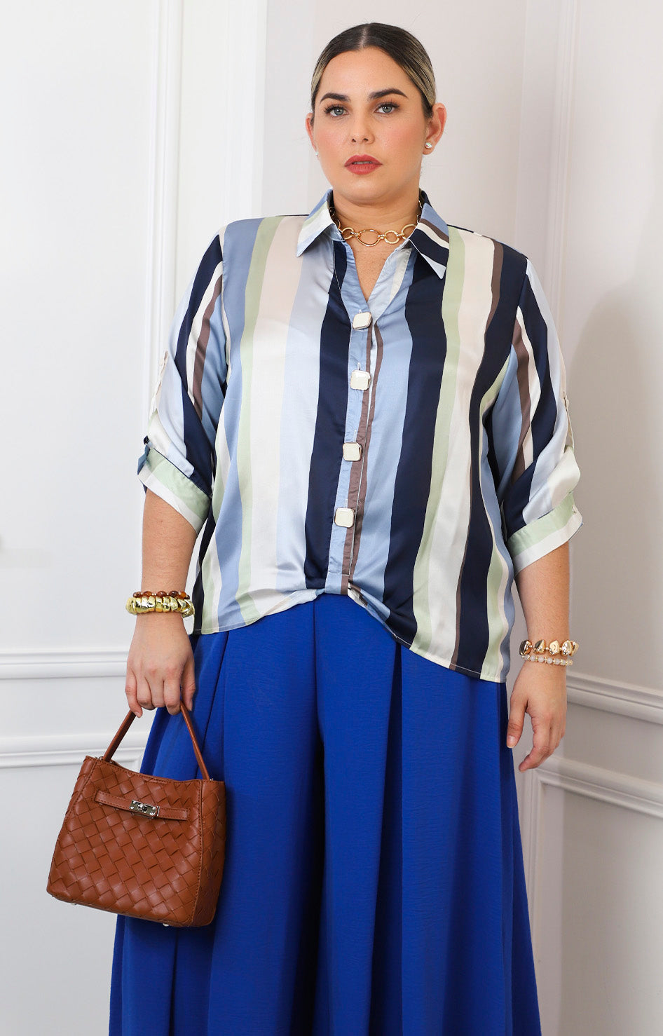 Blusa satinada a rayas azul