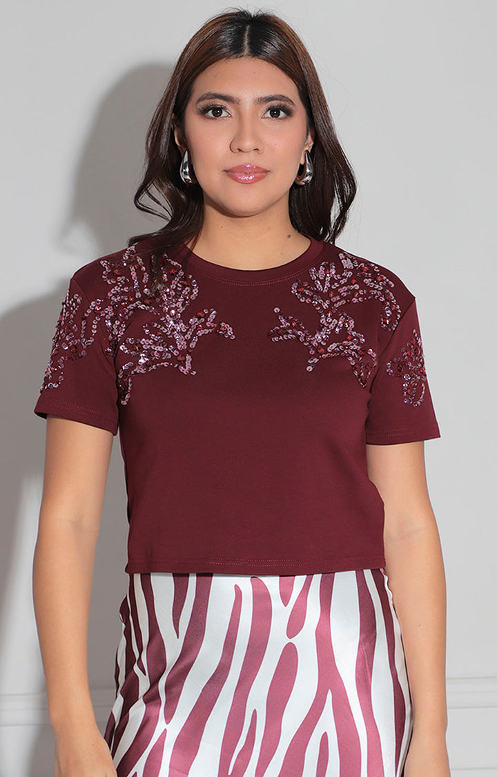 Blusa vino con aplicaciones