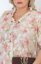 Blusa con estampado floral y bordado