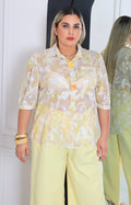 Blusa estampada con maxi botones