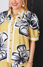 Conjunto amarillo floral gráfico