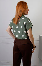 Blusa de manga larga con estampado de puntos y detalle de amarre de la marca Boutiquemirel.