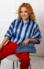 Blusa camisera a rayas con botones