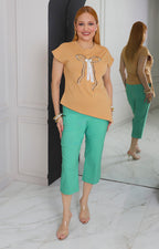 Blusa con aplique de moño