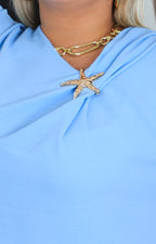 Blusa lisa con estrella