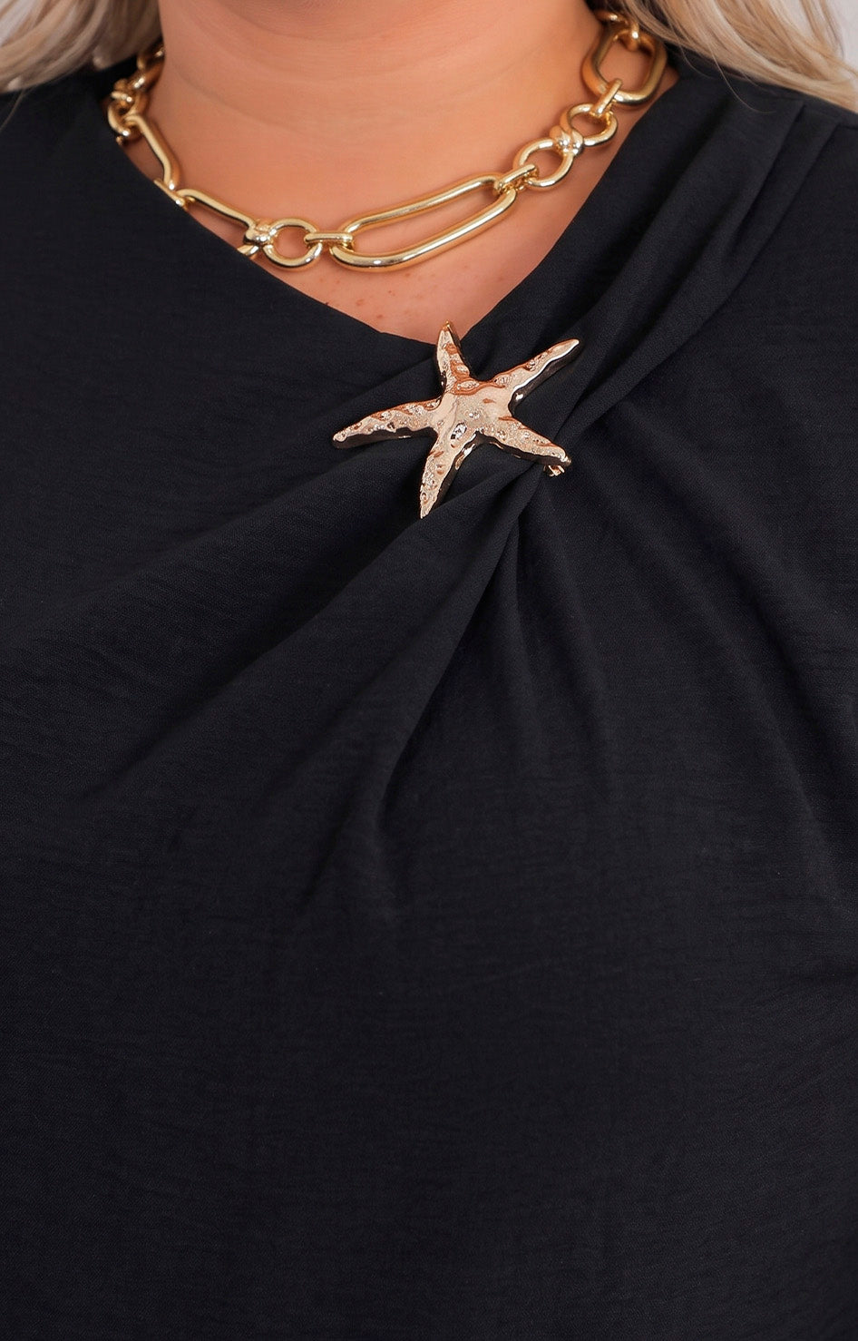 Blusa lisa con estrella