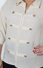 Blusa con botones dorados