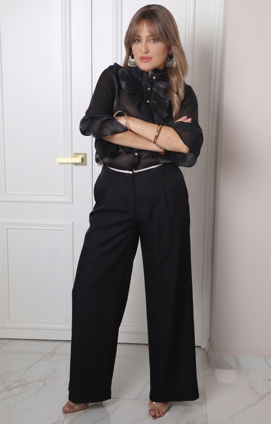 Blusa con olanes y mangas largas