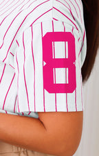 Blusa de rayas y aplicaciones de brillo