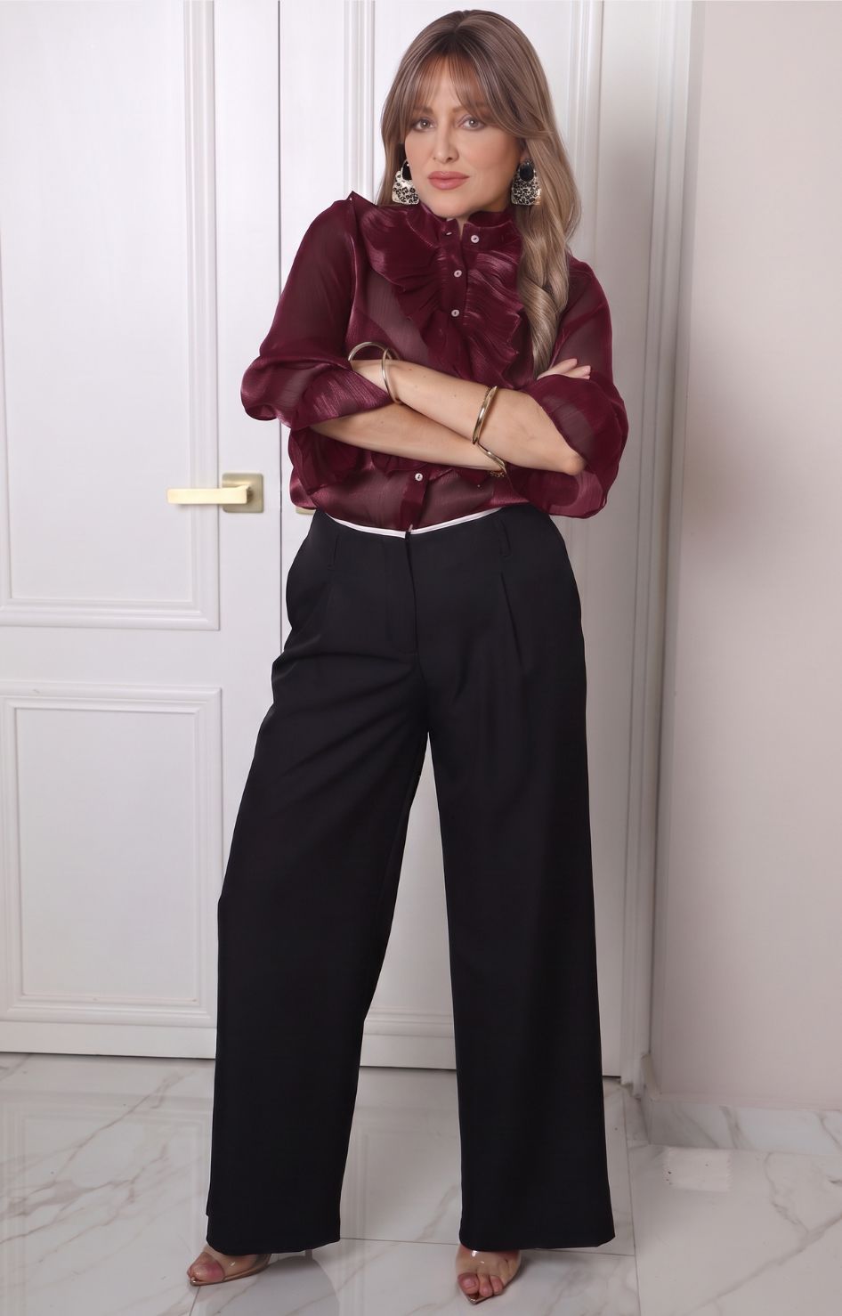 Blusa con olanes y mangas largas