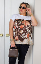 Blusa con estampado floral y aves