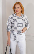 Blusa camisera con estampado de mosaico y aplicaciones