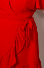 Vestido cruzado con escote en V y lazo