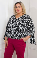 Blusa negra estampada