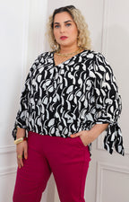Blusa negra estampada