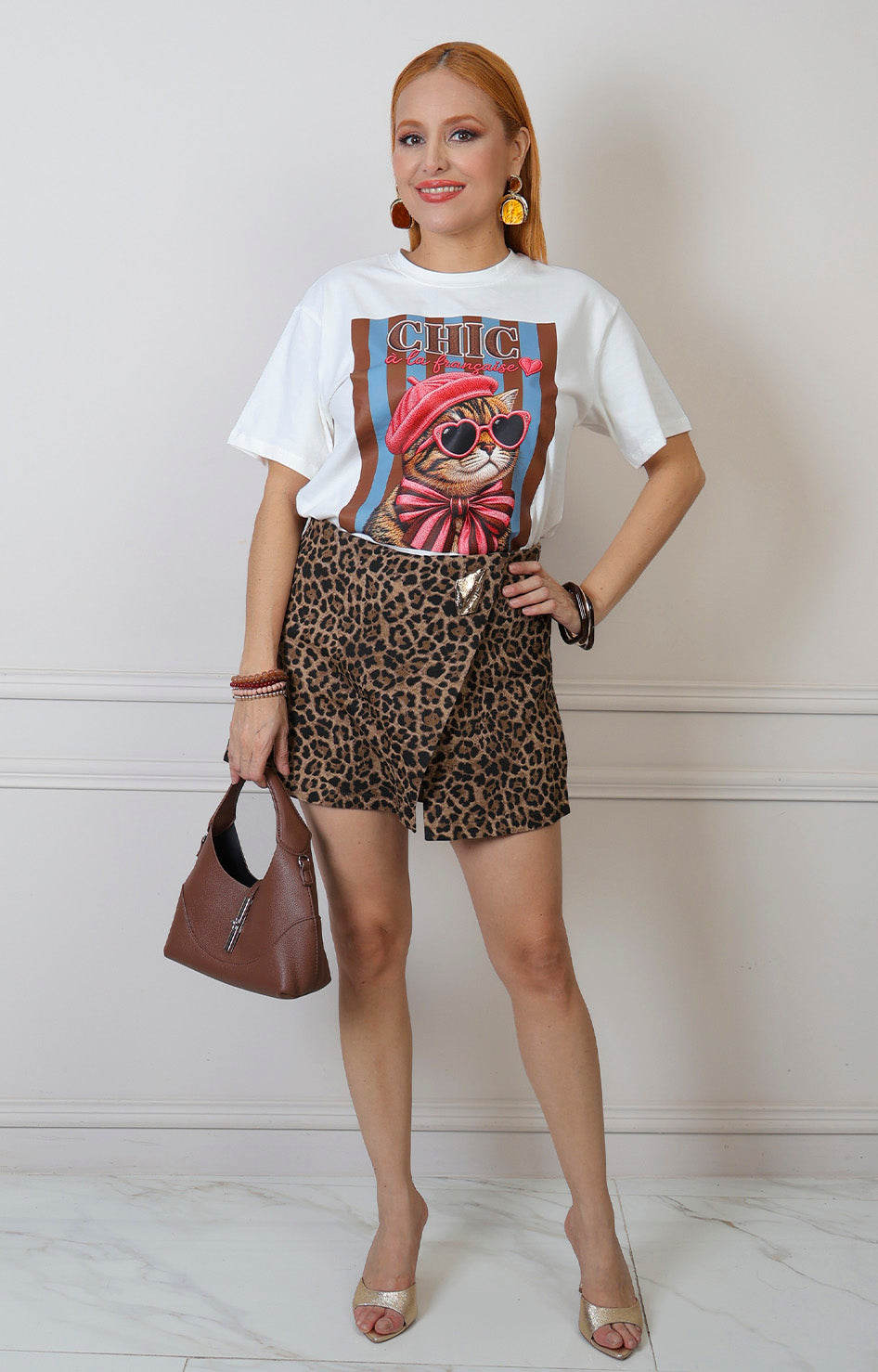Falda short animal print con detalle dorado
